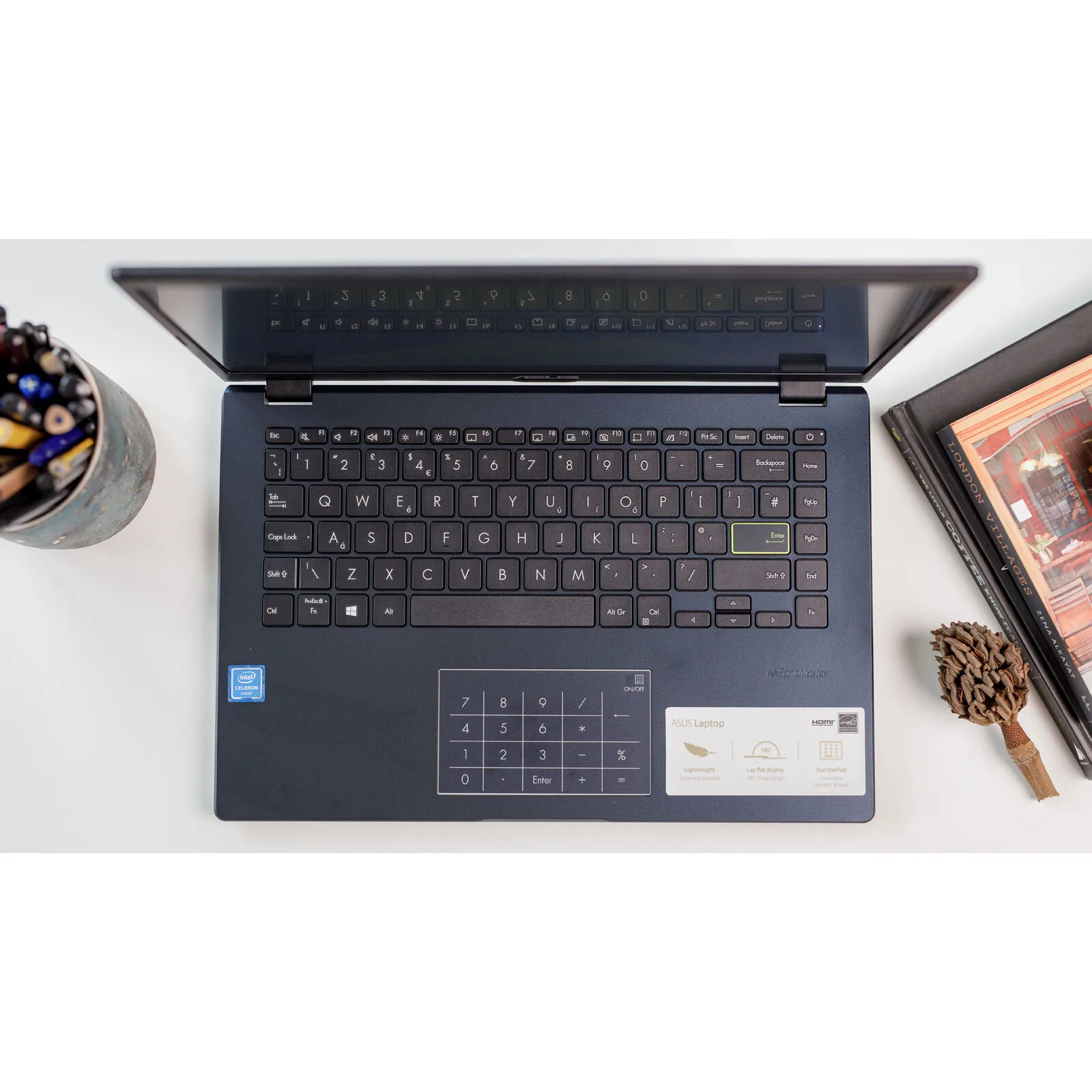 لپ‌تاپ ایسوس مدل Vivobook Go 14 E410KA-CL464 با پردازنده Celeron N4500، رم DDR4 4GB، حافظه eMMC با ظرفیت 64GB، نمایشگر 14 اینچ TN با وضوح HD، دارای نامبرپد دیجیتال